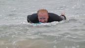 SX08862 Marijn paddling at Porth Beach, Newquay.jpg